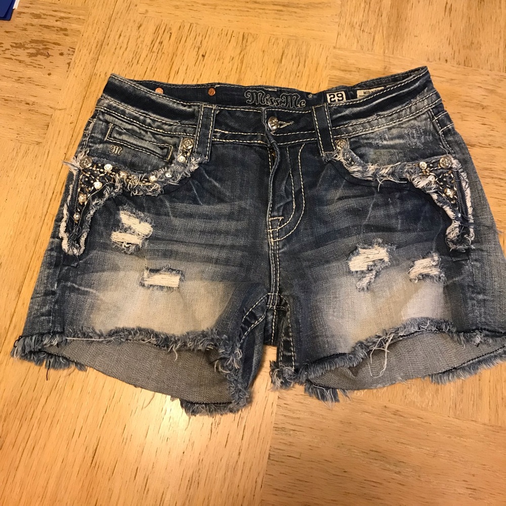 Size 29 Mid Rise Miss Me Shorts.